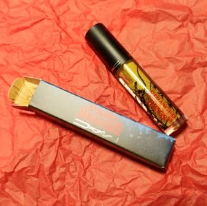 MAC Cosmetics Stranger Things Lipglass in Marvelous Max -sheer shimmering yellow